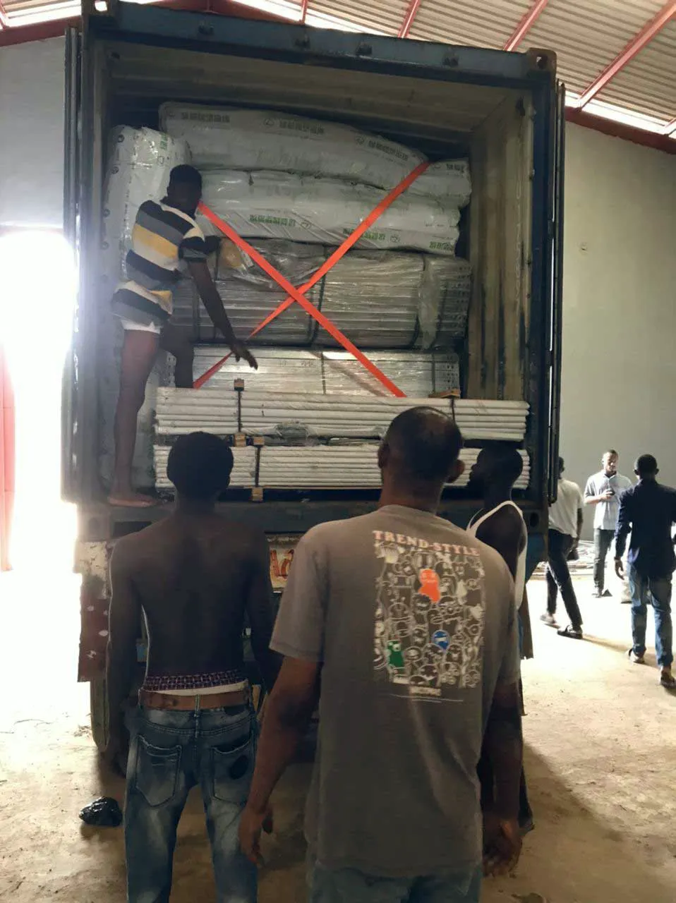 Strapping the load in the container