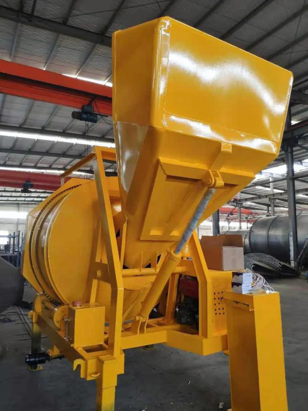 Concrete mixer hopper and drum